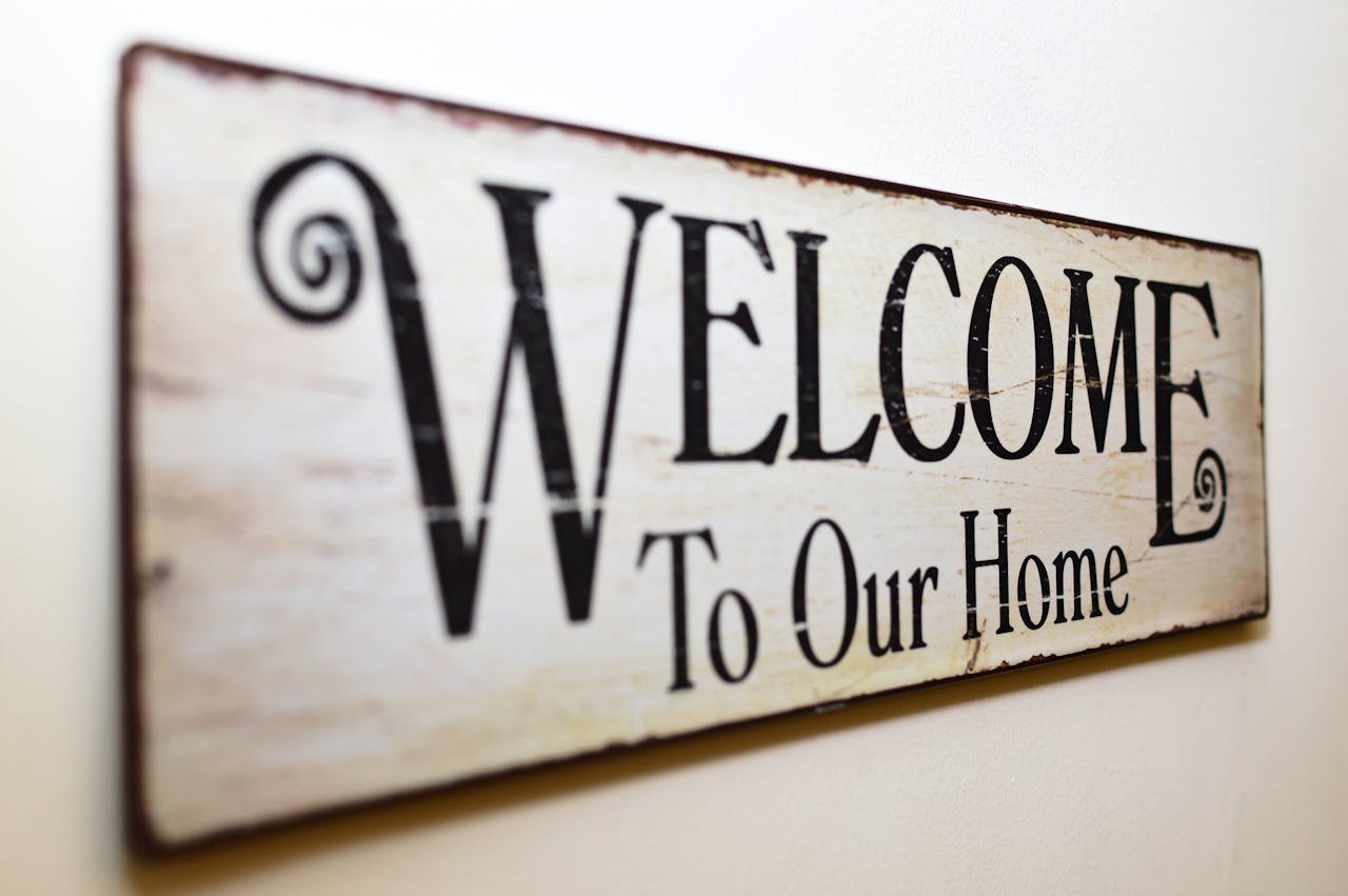 About A stylish rustic wooden welcome sign perfect for home decoration.